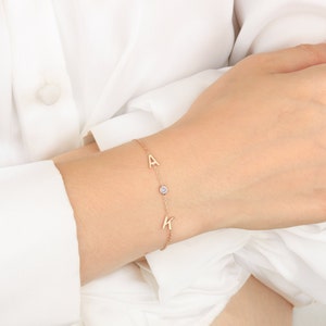 Sideways initial bracelet top