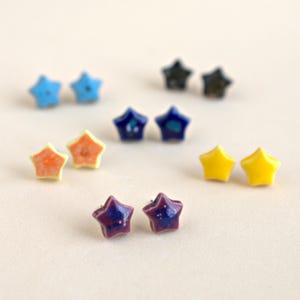 Small ceramic star earrings. Colorful, affordable, everyday clay star studs. Unique, handmade jewelry.