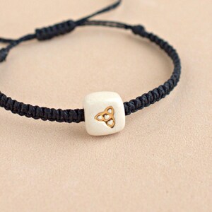 Celtic triquetra knot bracelet. Handmade ceramic and macramé bracelet for women. Ceramic jewelry with Celtic symbols. Gift for her.