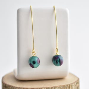 Small ceramic dangle earrings. Long hook with a minimalist handmade porcelain ball. Simple jewelry gift for her.