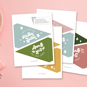 May include: Printable pennant flags for a first day of school celebration. The flags are in green, blue, yellow, and pink with the text "First Day of Kindergarten", "First Day of 2nd Grade", and "First Day of 3rd Grade".