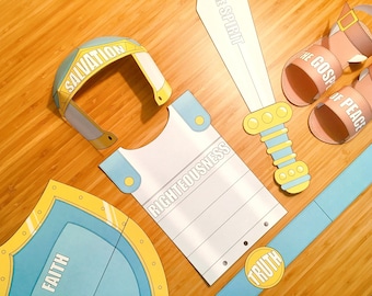 May include: A set of paper armor and weapons for kids, featuring the words "Salvation", "The Gospel of Peace", "The Spirit", "Righteousness", "Truth", and "Faith".
