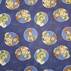 Disney/Pixar Toy Story Buzz and Woody Badges 100% Cotton Fabric, Licensed Cotton Fabric, Springs Creative LLC Fabric, CP67289