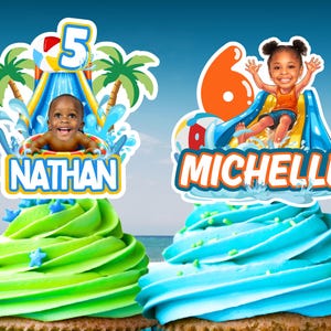 May include: Two custom cupcake toppers featuring water park themes. One topper shows a child in a pool with the number 5 and the name NATHAN. The other shows a child on a slide with the number 6 and the name MICHELLE. Both are placed on frosted cupcakes.