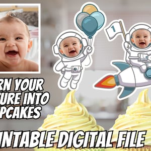 May include: Printable cupcake toppers featuring an astronaut with a rocket ship and balloons. The astronaut has a space helmet with a photo cutout for a child's face. The text "TURN YOUR PICTURE INTO CUPCAKES" is at the bottom of the image.