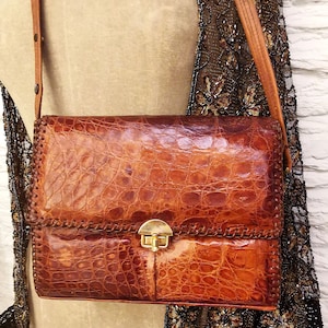 Bolso de mano tipo cartera de cuero Etco de los años 50