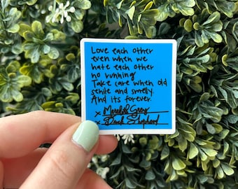May include: A blue sticky note with the text "Love each other even when we hate each other ho running Take care when old sehile and smelly. And its forever. x Meredith Grey x Drak Shepherd" written in black marker.