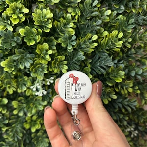Wir wünschen &quot;UA&quot; Frohe Weihnachten Pissoir gesundheitspflege/pflegerin Badge Reel