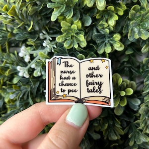 May include: A sticker of an open book with the text "The nurse had a chance to pee and other fairy tales".