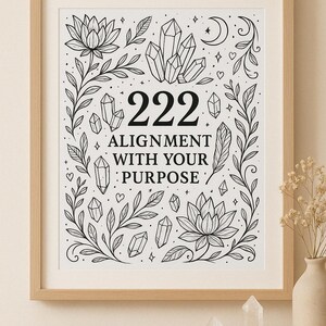 May include: A black and white printable art print with the number 222 and the text "Alignment with your purpose" surrounded by crystals, flowers, and leaves.