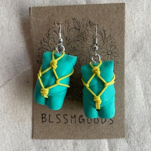 set of two plus size male with shibari yellow