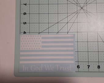 American flag decal with in god we trust written below it.