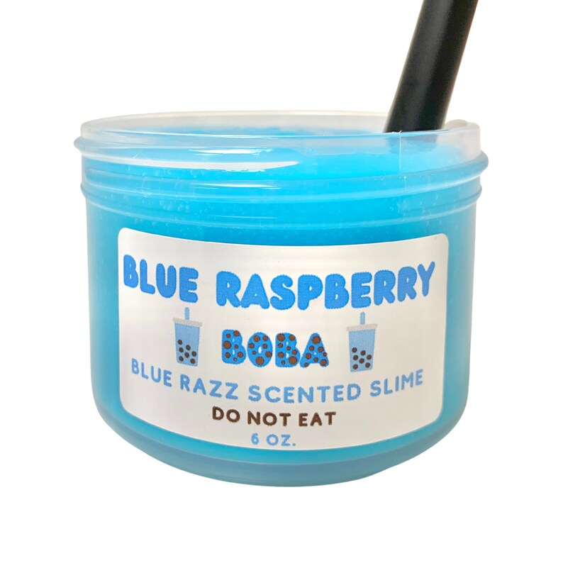 May include: A clear plastic container filled with blue slime, labeled "Blue Raspberry Boba Blue Razz Scented Slime Do Not Eat 6 oz."