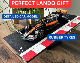 Lando Norris F1 1:43 McLaren Diecast Model Car on Formula 1 Track Display Stand