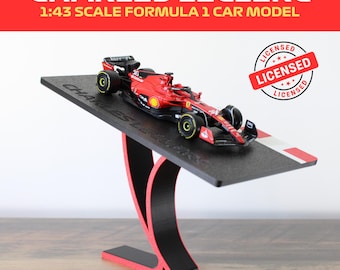 Charles Leclerc F1 1:43 Ferrari Diecast Model Car on Elegant Formula 1 Track Display Stand