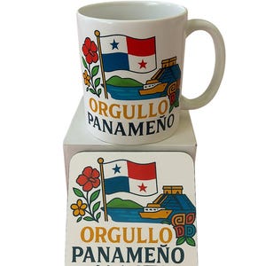 May include: White ceramic mug and coaster set featuring the Panamanian flag, a ship, and floral elements. The mug and coaster display the text "ORGULLO PANAMEÑO" in gold lettering. The design includes red, blue, and white colors.