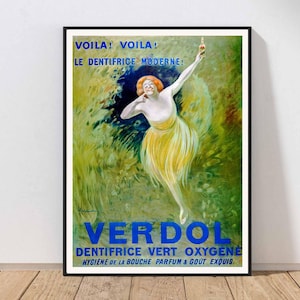 May include: Vintage advertisement poster for Verdol toothpaste. The poster features a woman in a yellow dress with red hair, holding a tube of toothpaste. The poster has blue and green text that reads "VOILA! VOILA! LE DENTIFRICE MODERNE! VERDOL DENTIFRICE VERT OXYGENE HYGIÈNE DE LA BOUCHE PARFUM & GOÛT EXQUIS."