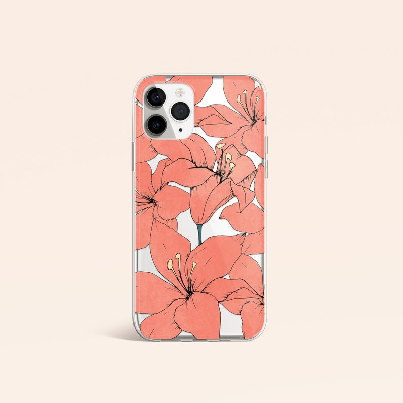 Puede incluir: Una funda transparente para tel&eacute;fono con un dise&ntilde;o floral. Las flores son rosas y blancas y tienen un efecto acuarela. La funda est&aacute; dise&ntilde;ada para un iPhone.