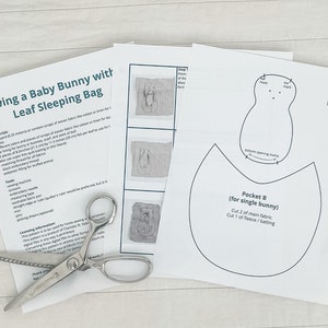 May include: Sewing pattern instructions for a baby bunny leaf sleeping bag. The pattern includes a pocket for a single bunny, with instructions to cut two pieces of main fabric and one piece of fleece or batting.