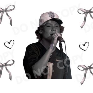 May include: Black and white image featuring a person singing into a microphone, wearing a baseball cap. The image is surrounded by gray bows, black hearts, and a silhouette with the text "maddox Batson".