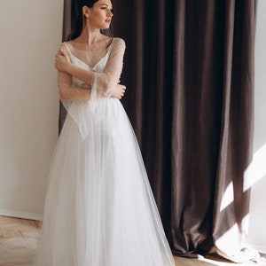 Two-piece pearl wedding dress with long flowing sleeves image 2