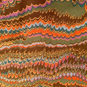 May include: Abstract textile pattern with wavy lines in shades of brown, orange, teal, purple, and green. The design has a marbled effect, with the colours blending and overlapping to create a dynamic visual texture.
