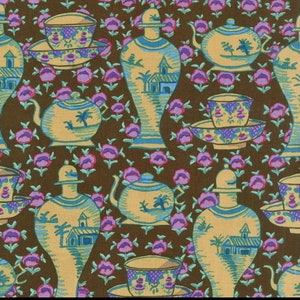 May include: A repeating pattern of teapots, cups and saucers, and vases with a floral design on a brown background. The pattern is in shades of blue, yellow, and purple.