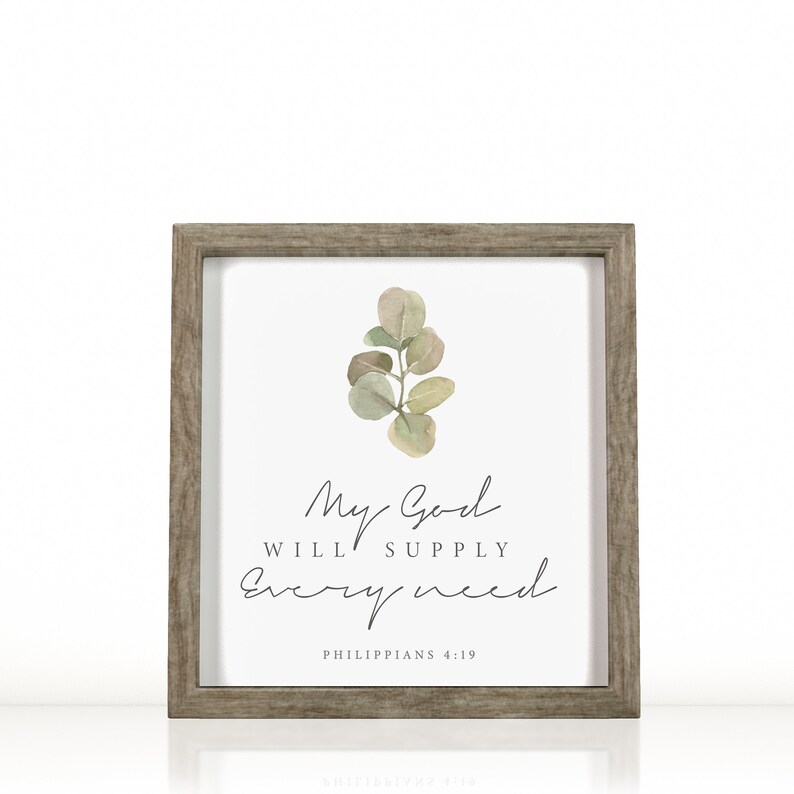 May include: A framed print with a watercolor illustration of a eucalyptus branch. The print features the text "My God will supply every need" and the scripture reference "Philippians 4:19".