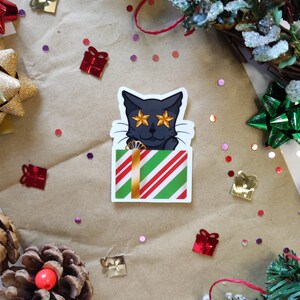 Chat de pegatinas y regalo de Navidad