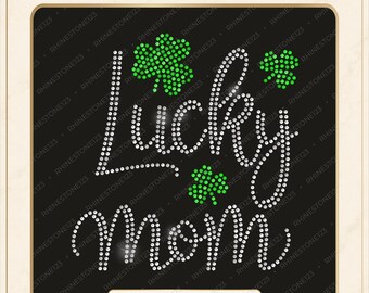 May include: A digital rhinestone template design featuring the text Lucky mom in white script lettering, accented with three green shamrock icons. The design is set against a black background with the text DIGITAL DOWNLOAD ONLY at the top.
