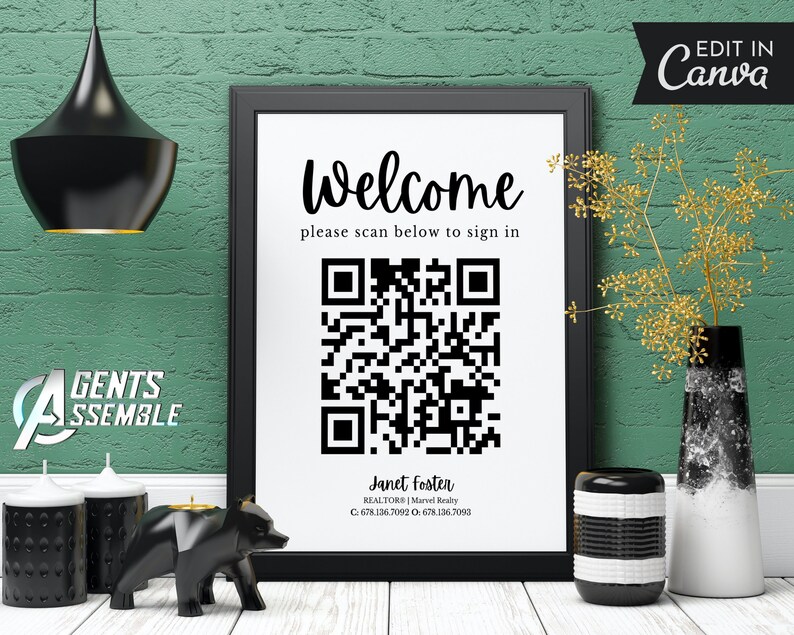 May include: A black and white sign with the text "Welcome" and "please scan below to sign in". A black and white QR code is below the text. The sign also includes the text "Janet Foster, REALTORS | Marvel Realty, C. 678.336.7092 O. 678.136.7053".