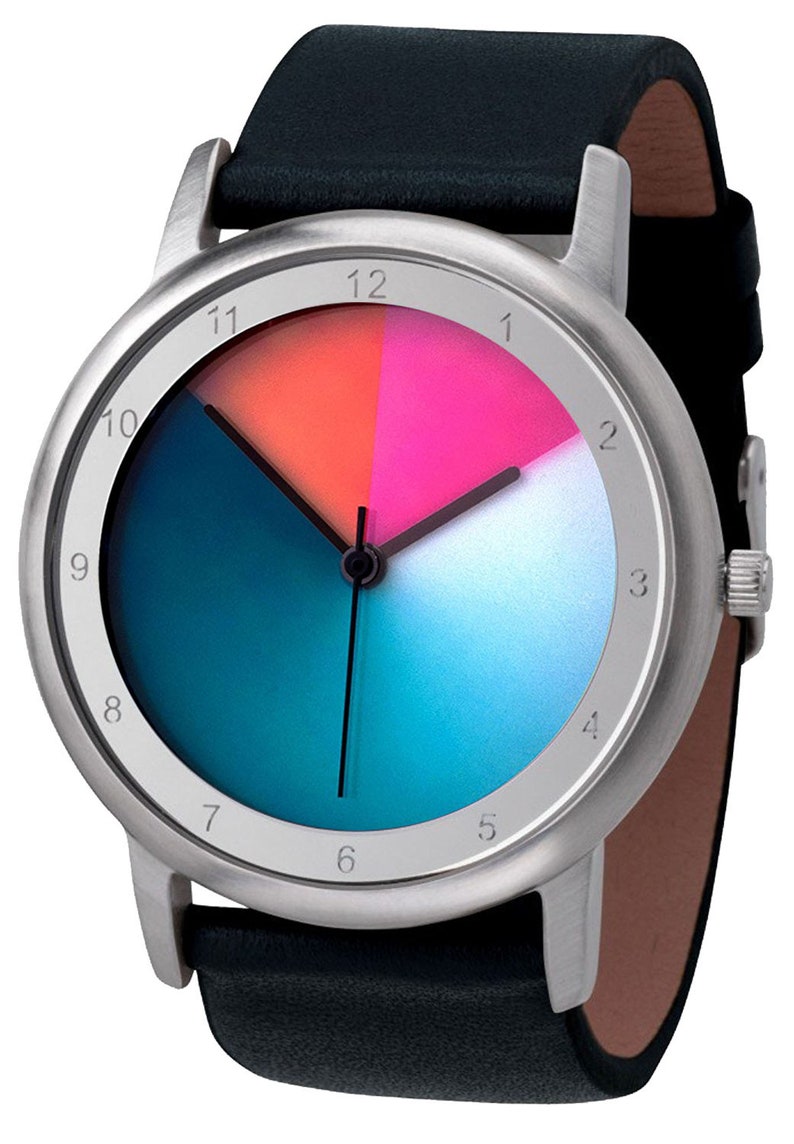 May include: A silver wristwatch with a black leather strap. The watch face has a gradient blue, white, pink, and orange design with black hour and minute hands. The numbers 1 through 12 are printed around the edge of the watch face.