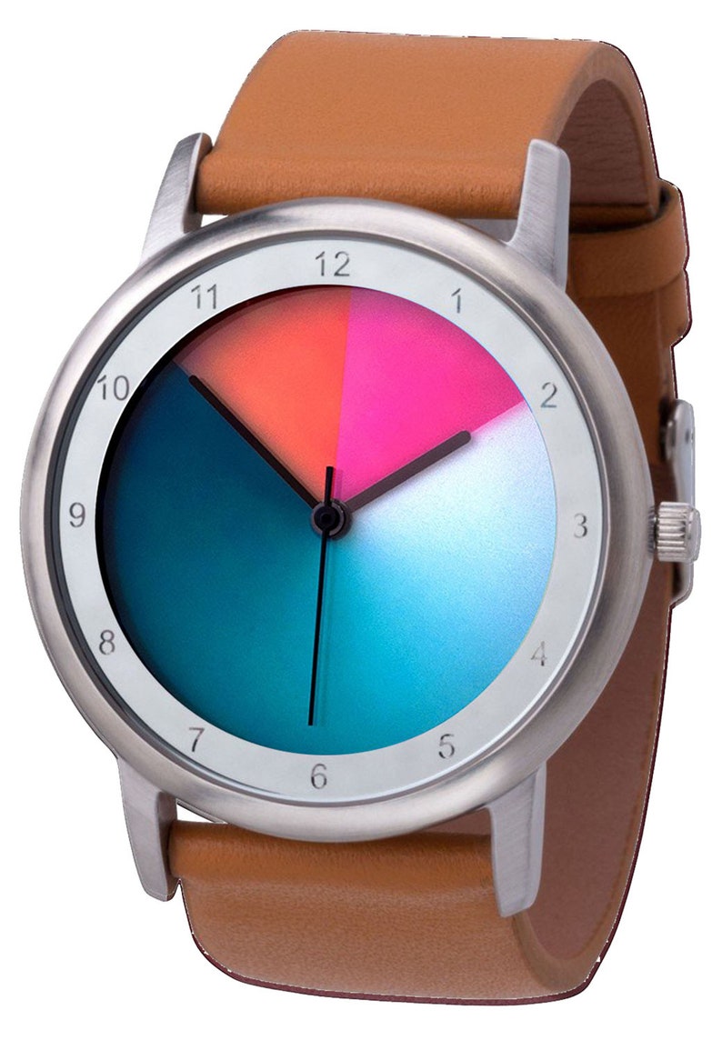 May include: A silver watch with a brown leather strap. The watch face has a white background with black hour and minute hands. The face is divided into four sections, each with a different colour: pink, orange, blue, and white.