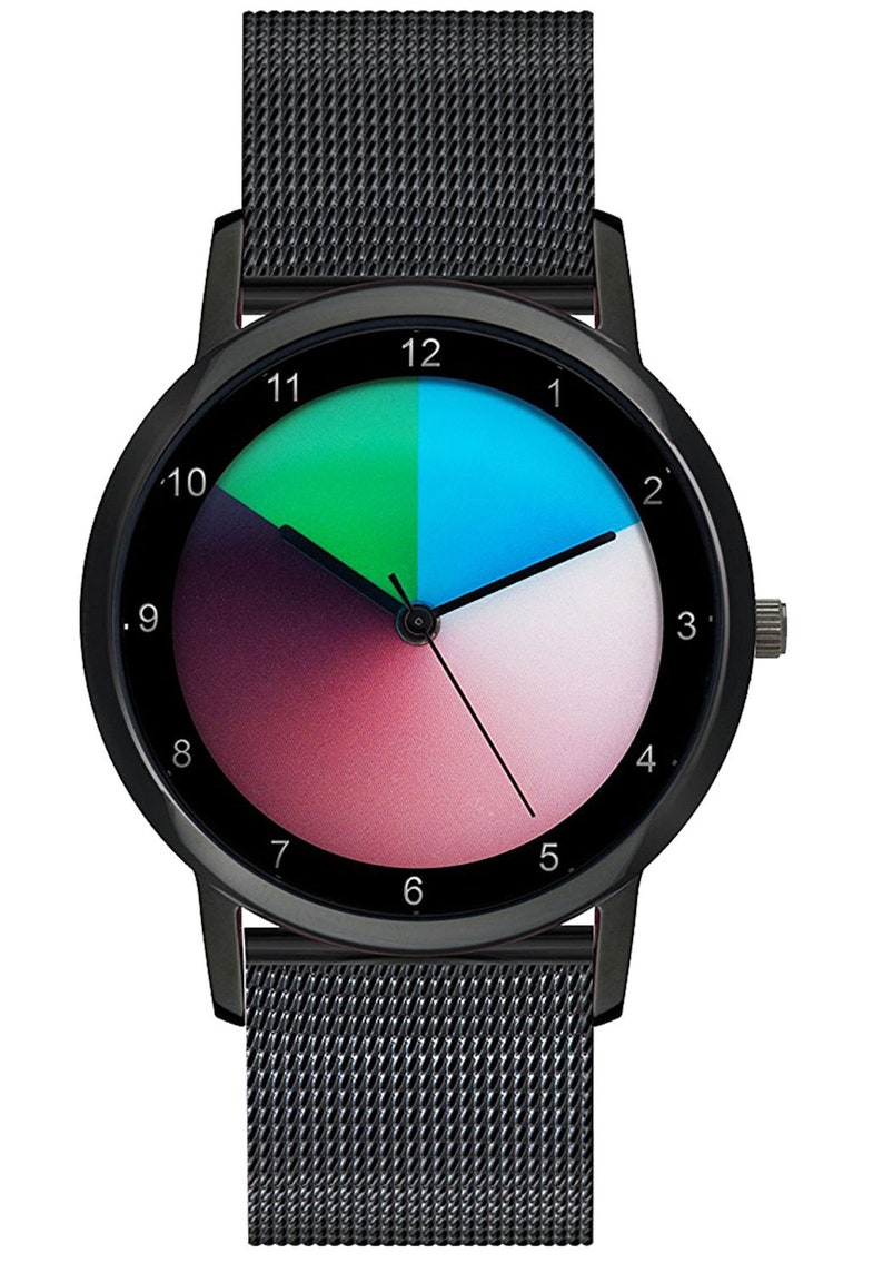 May include: A black wristwatch with a black mesh strap. The watch face has a circular design with a gradient of colours, including green, blue, pink, and white. The numbers 1 through 12 are displayed around the edge of the watch face.