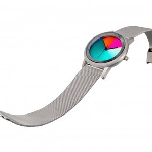 May include: A silver watch with a mesh strap and a colourful face. The face is divided into four sections, each with a different colour: blue, green, orange, and pink.