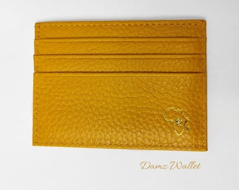 mostaza amarillo cartera afrocéntrica
