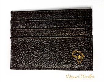 Cartera afrocéntrica marrón