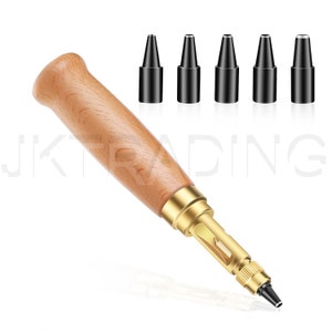 May include: A leather craft tool with a wooden handle and a gold metal punch. The tool comes with five different sized punches, all black.