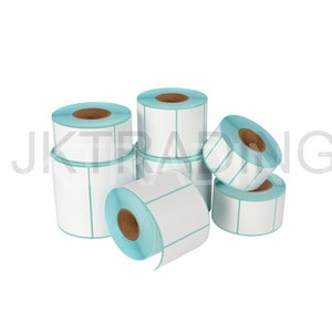 May include: Rolls of white labels with blue backing on a white background. The labels are in various sizes and are stacked on top of each other.