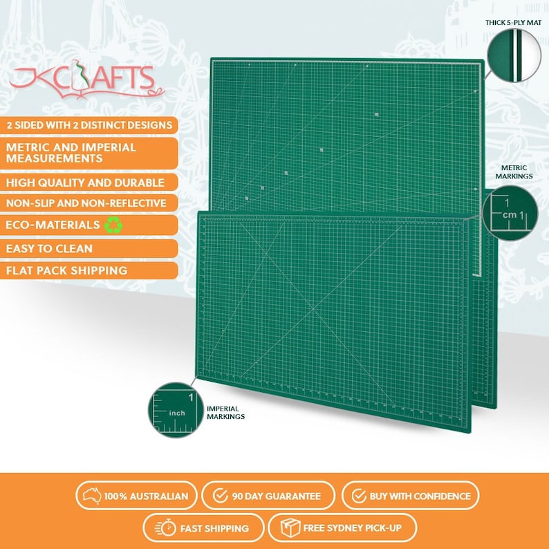 May include: Two green self-healing cutting mats with grid lines and inch and centimeter markings. The mats are stacked on top of each other. The top mat has a white border and the bottom mat has a black border. The mats are 5-ply thick.