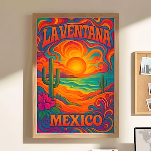 May include: A framed art print with a vibrant, psychedelic design. The artwork features a desert landscape with cacti, a large sun, and the text "LAVENTANA MEXICO" in bold letters. The color palette includes orange, blue, and pink hues.