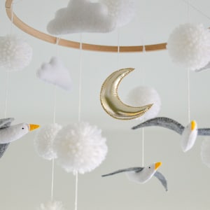 Ocean nursery mobile Hanging Seagulls Newborn nursery Monochrome Sea nursery decor Baby shower gift Neutral Moon Pom poms Clouds Coastal