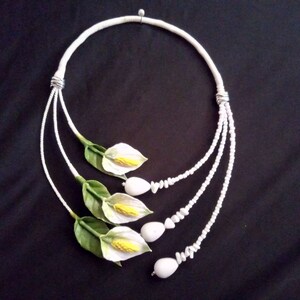 Necklace made of polymer clay and agate beads.