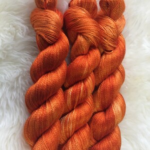 Pure silk yarn orange red (mulberry silk), 1700 (GP 240,- Euro/kg)