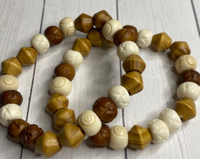Set of two wood bead stretch stack bracelets.