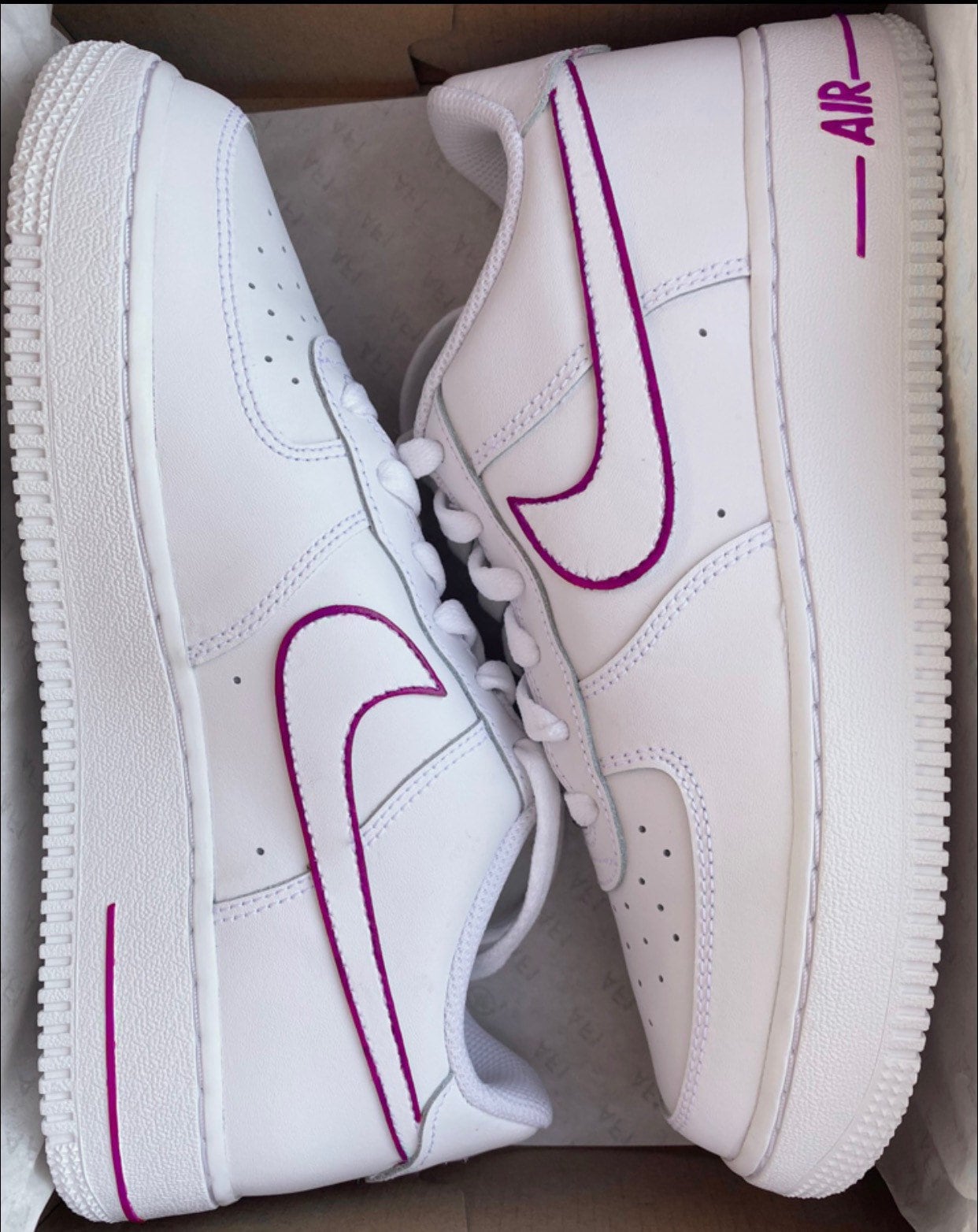 white air force 1 with pink tick