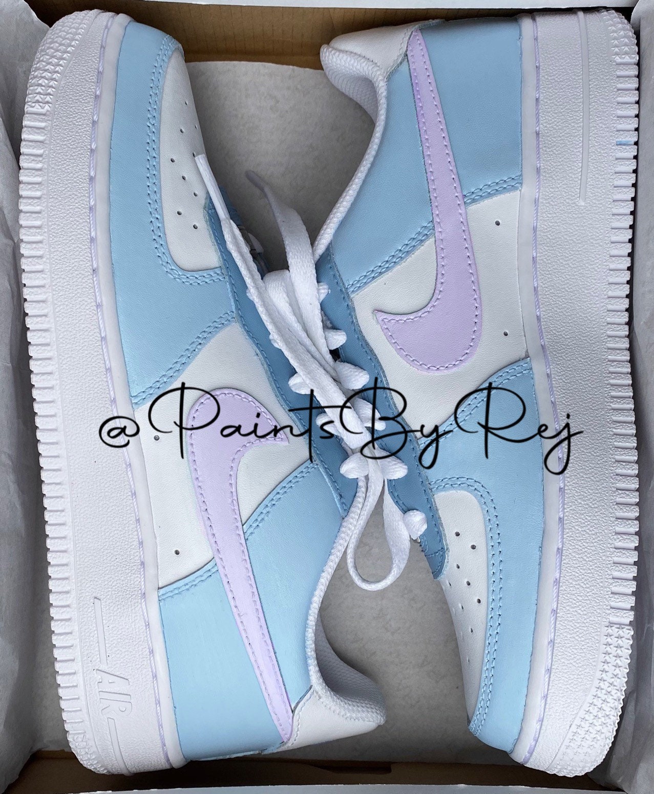 white air force with purple tick