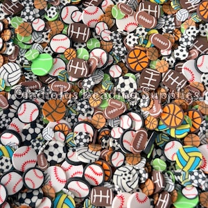 May include: A collection of sports-themed polymer clay pieces, including baseballs, basketballs, soccer balls, footballs, and volleyballs. The pieces are in various colors, including white, brown, orange, green, and blue. The text "Gladious Beading Supplies" is visible.