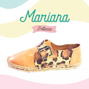 May include: Tan leather espadrille shoe with a buckle closure and a leopard print detail. The shoe is made by Mariana Patterns.