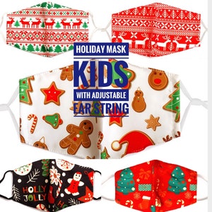 May include: Set of five Christmas-themed face masks for kids. The masks feature various holiday designs, including gingerbread men, candy canes, Christmas trees, and snowflakes. The masks have adjustable ear strings for a comfortable fit. "HOLIDAY MASK KIDS WITH ADJUSTABLE EAR STRING" is printed on the image.